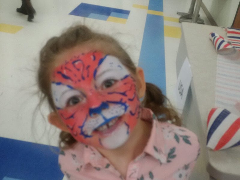 Girl with Tiger Face Paint at Carnival