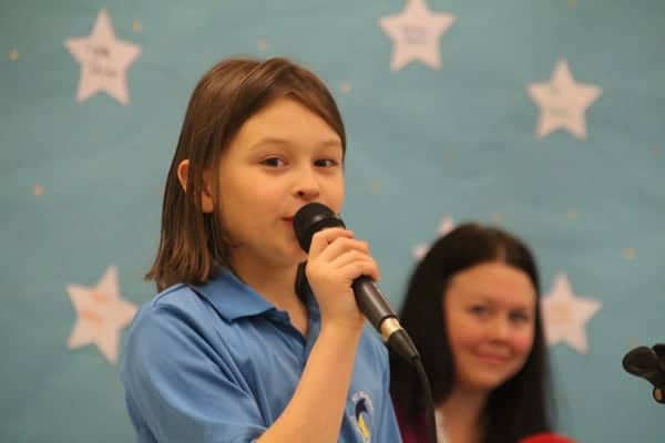 Talent Show Girl with Microphone